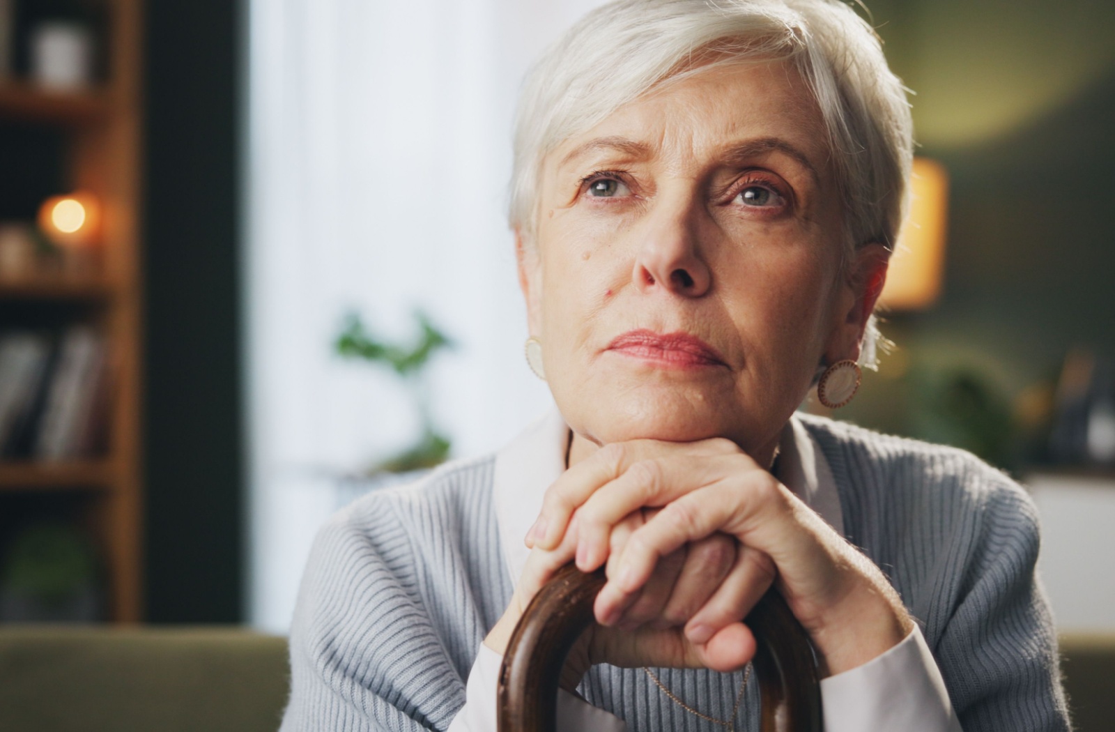 A senior staring off into the distance in wonder.